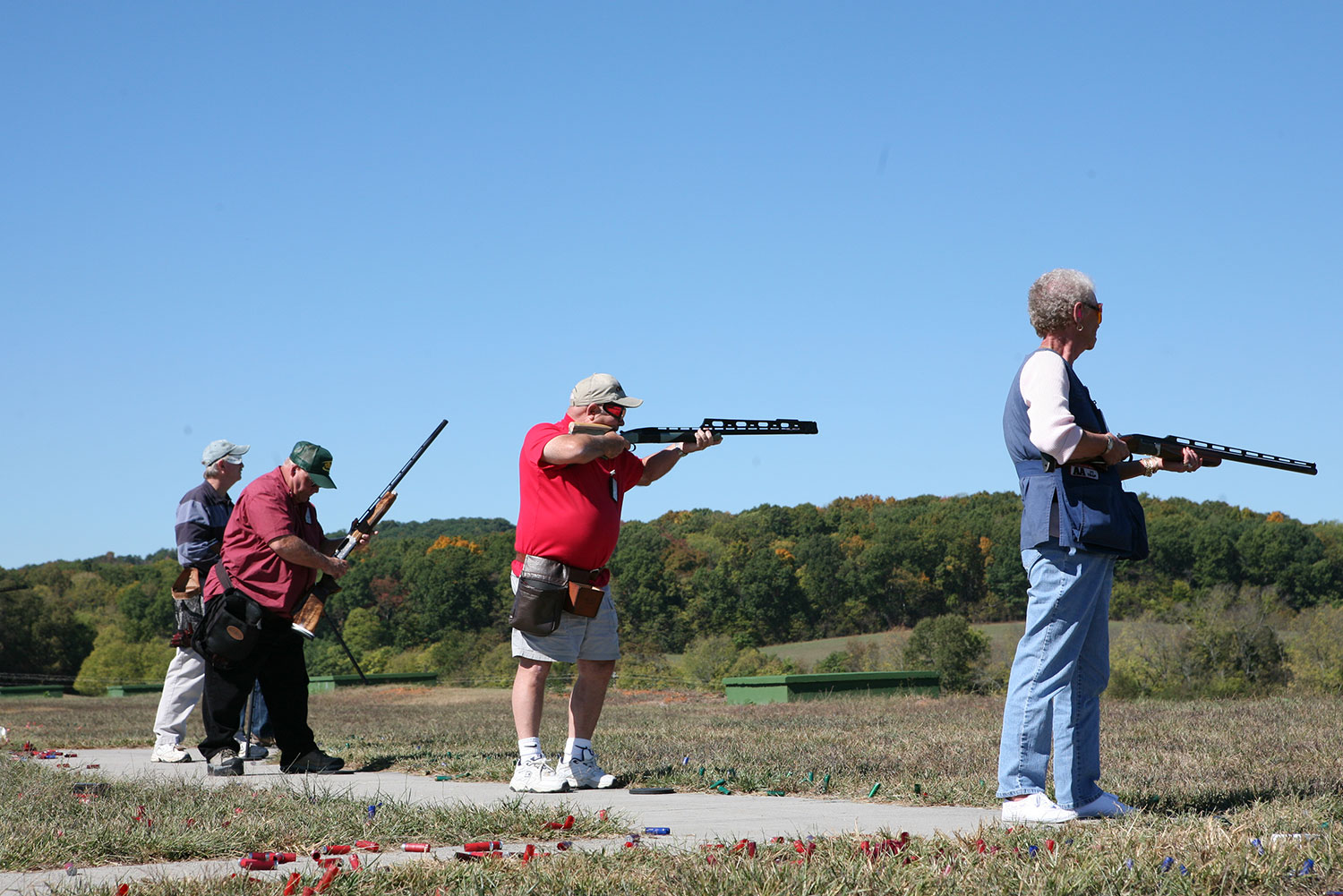 Squad of shooters taking turns on the line
